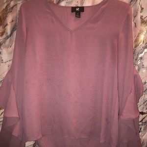 Purplish/pink top with ruffle sleeves
